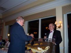 Torskemaster Dick Johnson, NBC 5 News Anchor and Reporter admires Barney the Cod